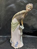 Front view of figurine showing full design