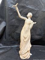 Full view of figurine front, showing overall form