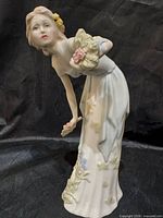 Front left view of porcelain figurine
