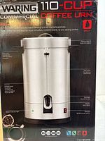 Front of boxed Waring 110-Cup Coffee Urn showing product image and capacity