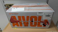 Retail box showing AIVOLT branding and product details