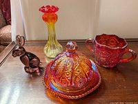 All four glass items displayed together