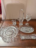 All six glass pieces grouped on table