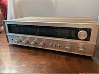 Front view of Fisher receiver showing faceplate, controls, tuning dial