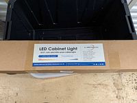Closed box labeled LED Cabinet Light Lampaqous LPS-FSE-24W