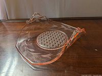 Oblique view showing tray shape, color and etched design