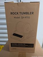Front of box showing Rock Tumbler model QH-RT01