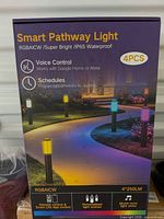 Front of retail box showing Smart Pathway Light features