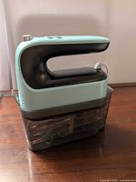 Mixer assembled on storage case showing color and design