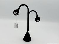 Display stand showing both earrings front view