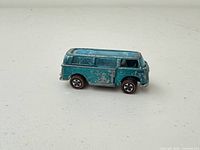 Left side view of blue Hot Wheels van