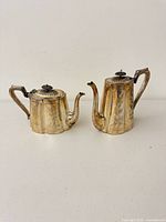 Both Sheffield EP 866 pots side by side showing relative sizes and design