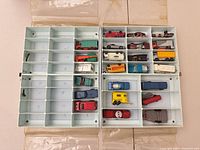 Open storage case showing all compartments and majority of vehicles
