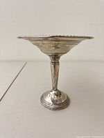 side view of sterling pedestal platter