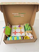 Open Lovevery box showing all items