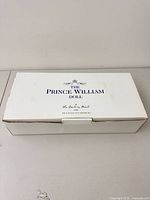 Closed white box labelled The Prince William Doll The Danbury Mint