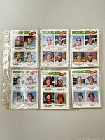 Six rookie baseball cards in plastic sleeve