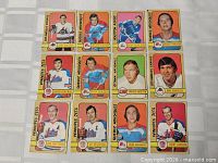 Full 3×4 grid showing all 12 1972-73 OPC WHA cards