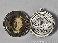 Interior view with sepia portrait photo left and embossed floral panel right