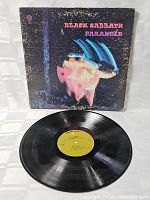 Front cover and vinyl showing label