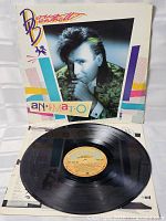 Front cover with record partially pulled out