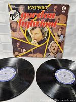Front view of album sleeve with both vinyl records displayed