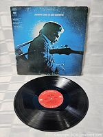 Front cover and vinyl record showing label