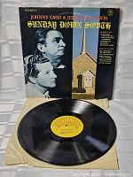 Front cover and vinyl removed from sleeve