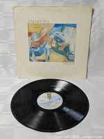 Front of sleeve with record displayed