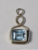 Front view showing aquamarine and bezel