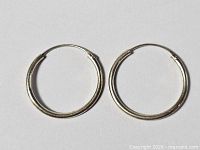 front view of both sterling silver hoop earrings