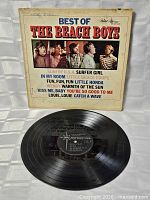 Front cover and record showing title, artwork and vinyl condition