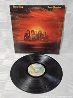 Front sleeve with vinyl record displayed
