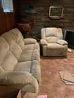 Three-seat sofa and matching reclining armchair in fabric upholstery
