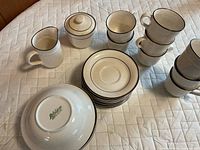 Full view of Arklow Honey Stone breakfast set showing cups, saucers, bowls, creamer and sugar bowl