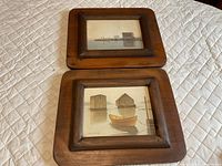 Two framed James Bessy watercolours on quilted surface