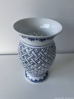 Front view of blue and white porcelain lattice vase
