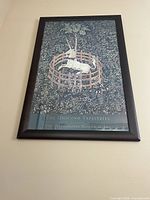 Framed Unicorn Tapestries poster hung on wall