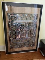 Front view showing entire framed papyrus artwork