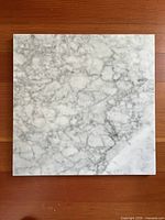 Top view of square marble board showing overall veining pattern