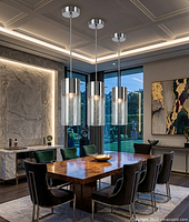 Rendering of pendant in dining room setting showing glass cylinder, chrome top, chain detail