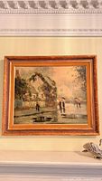 Full view of framed Rainy Day print hanging on wall