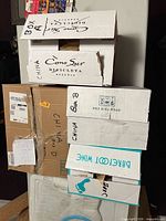 Stacked boxes labeled china containing dinnerware set