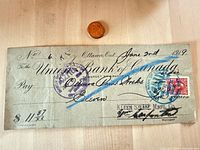 Front of 1919 Union Bank of Canada cheque with revenue stamp, cancellation and signatures