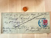Front of 1919 Union Bank of Canada cheque showing payee, amount, date, revenue stamp, and cancellation