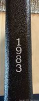 Spine of black RCM case stamped 1983