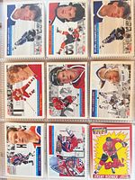Fronts of nine 1991 Score hockey cards in binder sheet