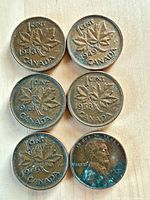 Canadian pennies reverse with dates 1948, 1949, 1941, 1958, 1945 and US 1953 obverse