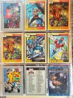 Nine DC Comics superhero trading cards in binder sleeve page