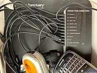 Top view of Sanctuary charging station showing connector list and internal cables
